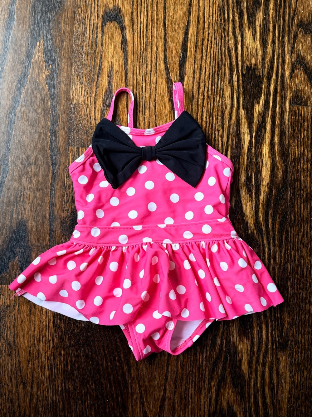 Ruffle Butts Hot Pink Polka Dot One-Piece Swimsuit with Black Bow